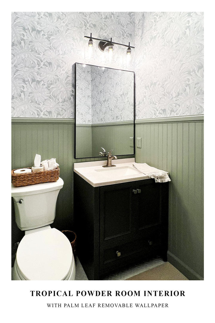 Tropical powder room interior with removable wallpaper