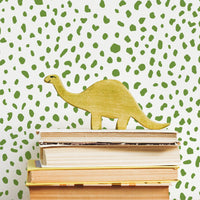 bright green spots pattern wallpaper with dinosaur decor