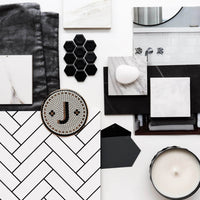 black and white herringbone design tile wallpaper for bathroom interiors