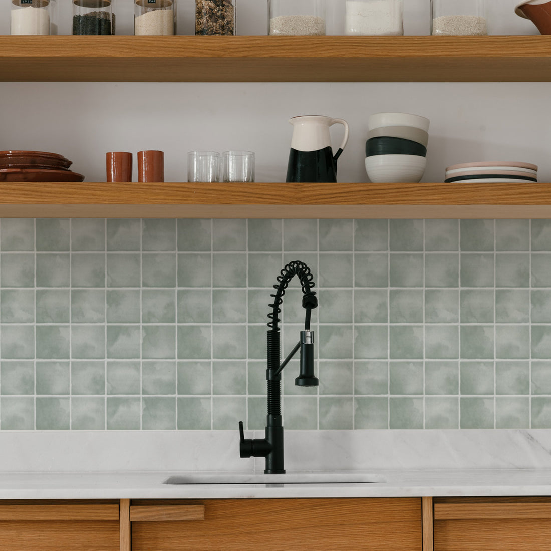 farmhouse kitchen backsplash with green tiles